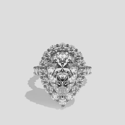 Judith diamond pear halo engagement ring in 18K white gold by Kurbãni Durjini, 360-degree view