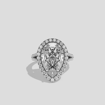 Helena diamond pear halo engagement ring in 18K white gold by Kurbãni Durjini, 360-degree view