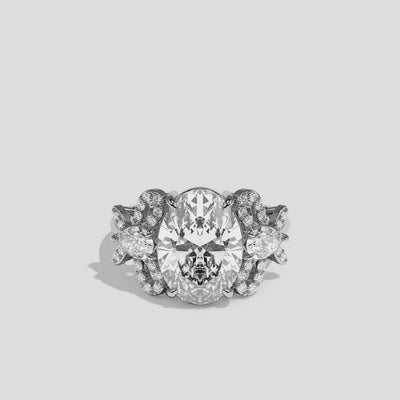 Malkah diamond oval halo engagement ring in 18K white gold by Kurbãni Durjini, 360-degree view