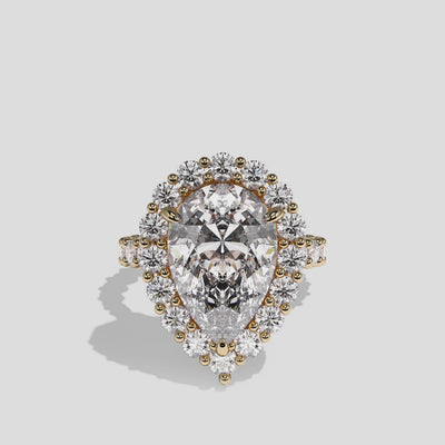 Judith Fairbourne diamond pear halo engagement ring in 18K yellow gold by Kurbãni Durjini, 360-degree view