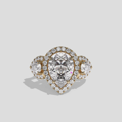 Dorothea Duchess diamond pear halo engagement ring in 18K yellow gold by Kurbãni Durjini, 360-degree view