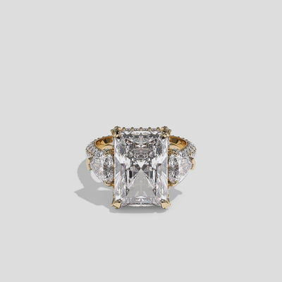 Mira Ellington 12.00ct diamond radiant halo engagement ring in 18K yellow gold by Kurbãni Durjini, 360-degree view